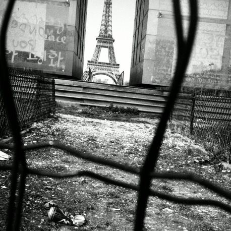 Another shot. Captured through some fence. It makes it look like Paris is being destroyed. At the time though it was an art piece that got vandalised.